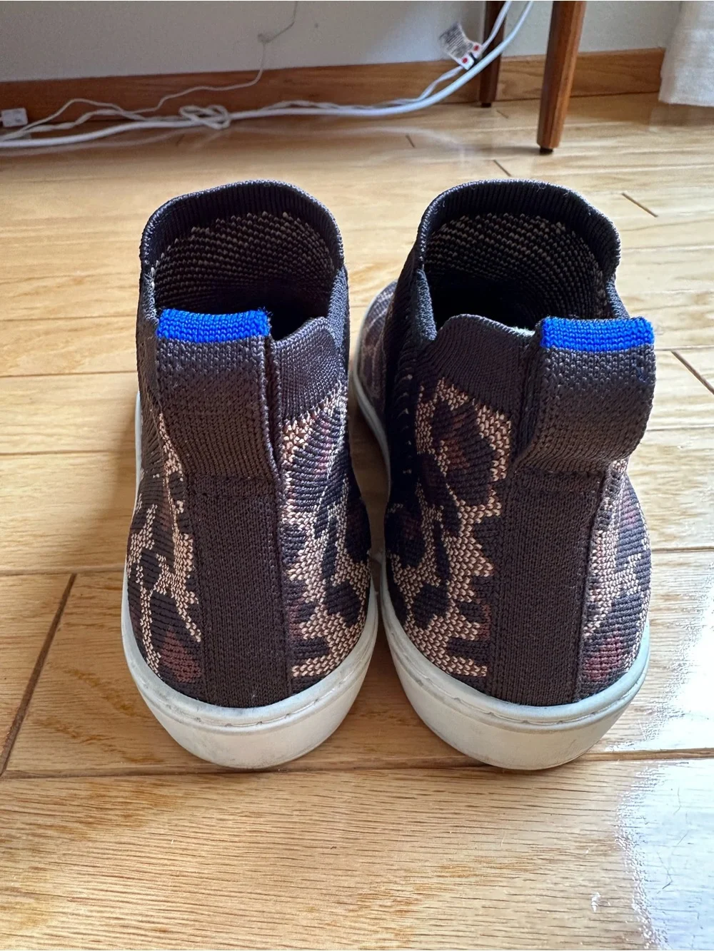 Rothy's Leopard Print Slip-On Ankle Sneakers in Brown and Black